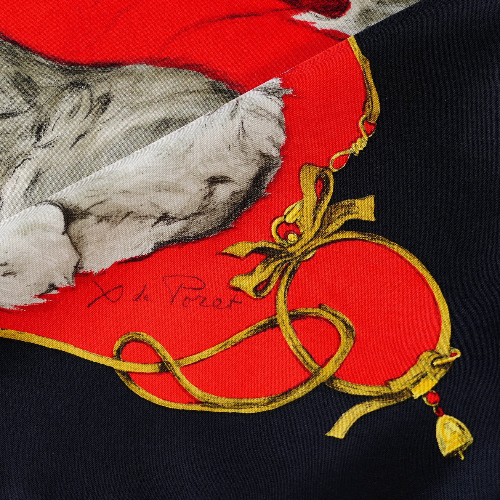 Détail de la signature de l'artiste Xavier de Poret sur le carré Hermès vintage Les Pékinois.